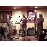 The Lion's Pride open mic. Scott Woodruff (host), John Hasnip, and Gary Lawless